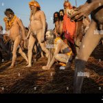 EDITORS NOTE: Image contains nudity Naga sadhus walk towards the holy waters of the Ganges river during the Kumbh Mela festival. Every twelve years millions of Hindu devotees begin a massive pilgrimage