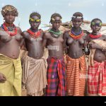 Dassanech or daasanach or dasenach people. Omorate Omo river Ethiopia Africa. Naked young girls and women Stock Photo