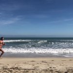 Running naked on the beach in slow motion