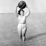 Fil:Beach ball bathing topless woman Fortepan 3688.jpg