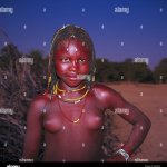South Africa Namibia Kaokoveld girl Himba nomad in the nude half portrait Africa woman young young persons jewellery view camera smile happily happily local native persons Stock Photo