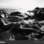 Filipino Young Nude Woman Lying Water Back Arms Head Rocky Stock Photo YAYImages 260264778