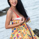 Busty Asian girl shows off her hairy pussy in the sea at Brdteengal
