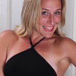 Over 30 blonde MILF Sky baring her small tits and shaved vagina