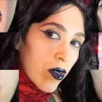 Gothic donkerblauwe lippenstift en glanzende lippen