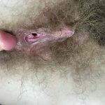 Hairy girl fucks her wet big clit pussy with dildo in close up