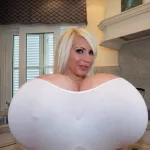Tanning addict Martina Big stuns Holly Willoughby on This Morning by revealing shes getting the worlds biggest breast implants using 35 pints of silicone in each boob