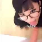 Asian Girl With Glasses Deepthroating Dildo