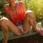 Naked shaved women outdoor photo