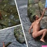 Pictured: Moment NAKED swimmer caught on camera while taking a dip in city centre canal
