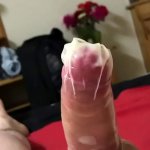 Filling the condom deep in her pussy