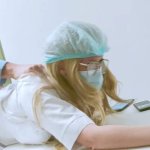 Doctor fucks a nurse on a table