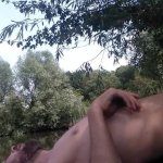 Crazy dude masturbating full nude near a public canal