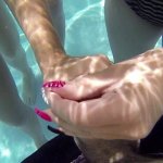 Bikini-clad porn-stars making out and getting fucked next to a pool