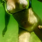fucking my pussy in the sea on a public beach