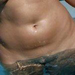 The wife! Naked in the pool. Want to see a forward roll under water?